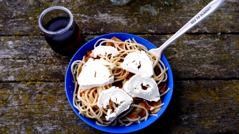 Olive and tomato pasta with fresh cheese and wine - YUM!